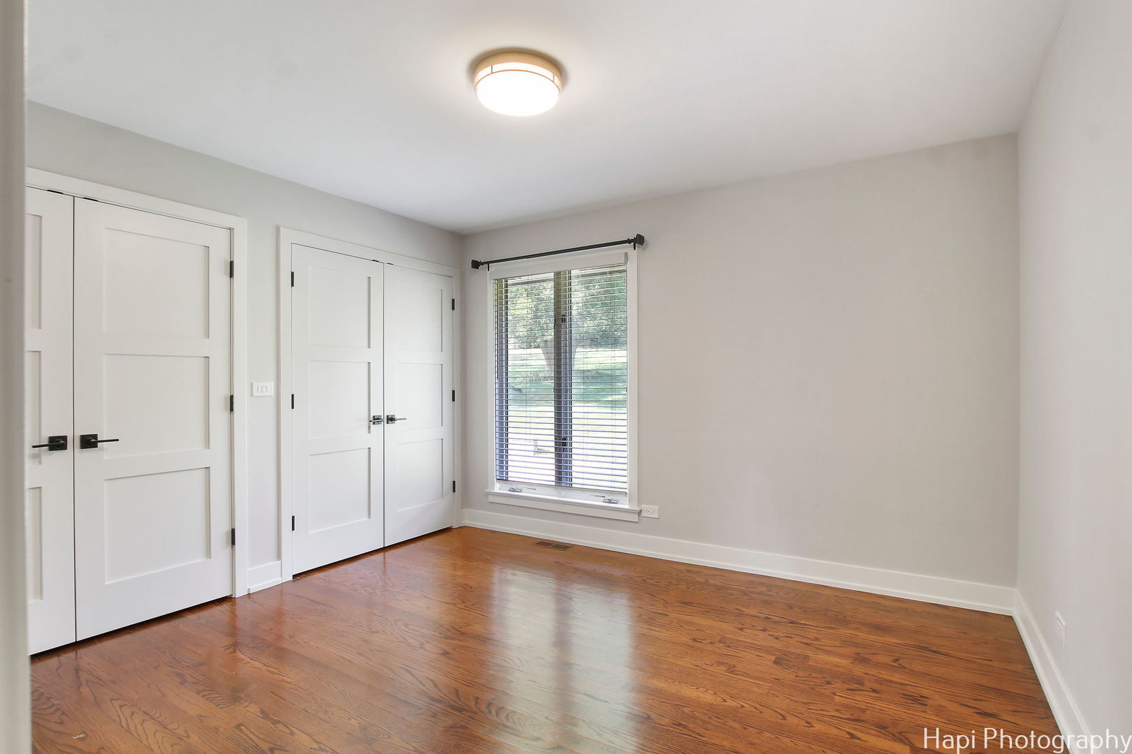 146 Harbor Drive Lake Barrington, IL 60010 - Photo 20 of 33 an empty room with wooden floor and windows
