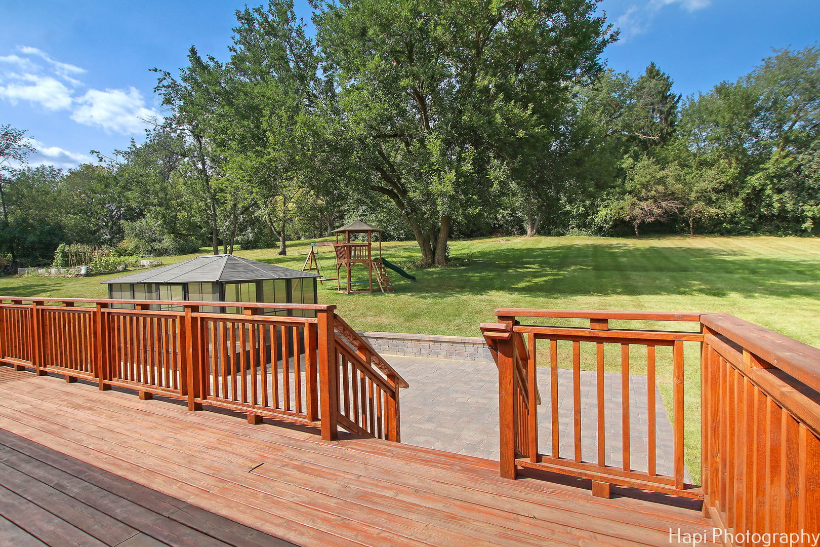146 Harbor Drive Lake Barrington, IL 60010 - Photo 26 of 33 a view of a wooden deck and a yard with swimming pool