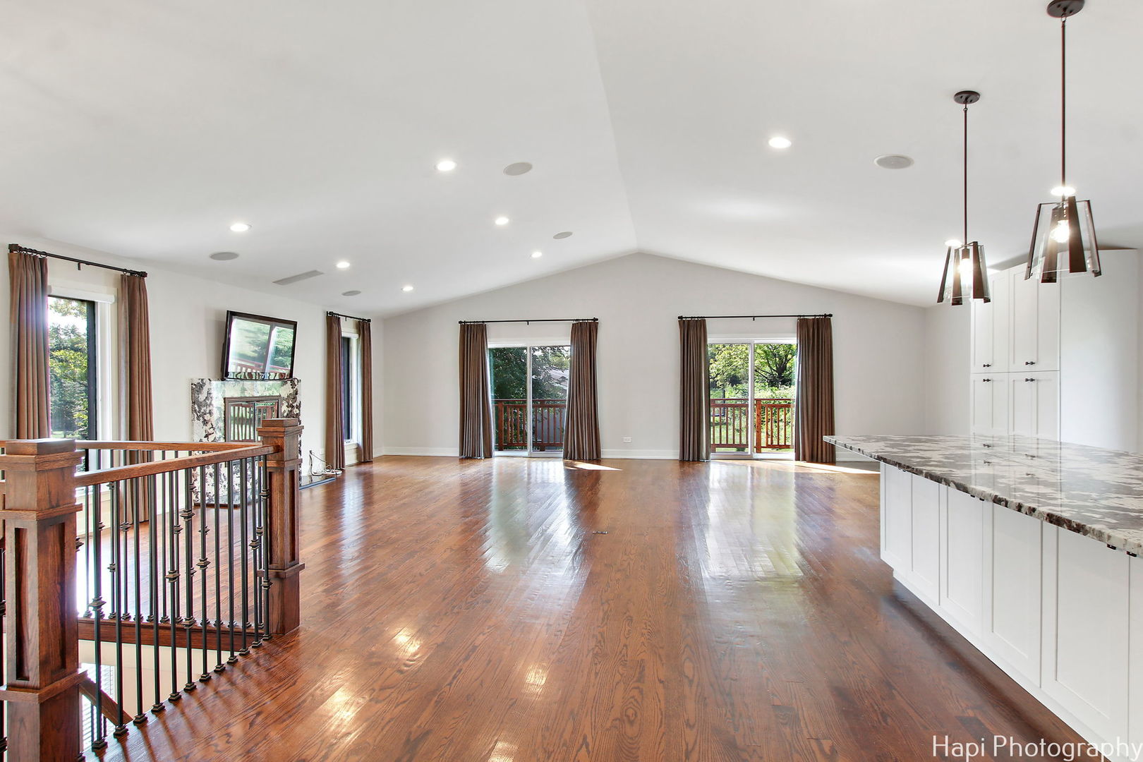 146 Harbor Drive Lake Barrington, IL 60010 - Photo 4 of 33 a view of a kitchen with granite countertop a large window and wooden floor