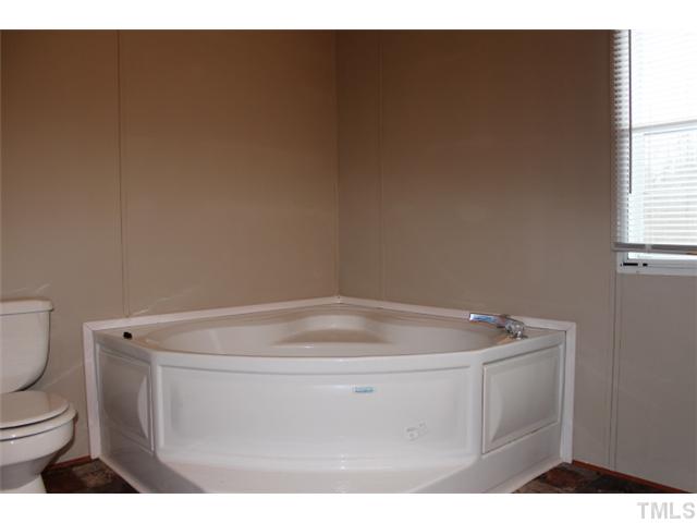 117 Vernon Hill Church Road Roxboro, NC 27574 - Photo 5 of 12 a utility room with dryer and washer