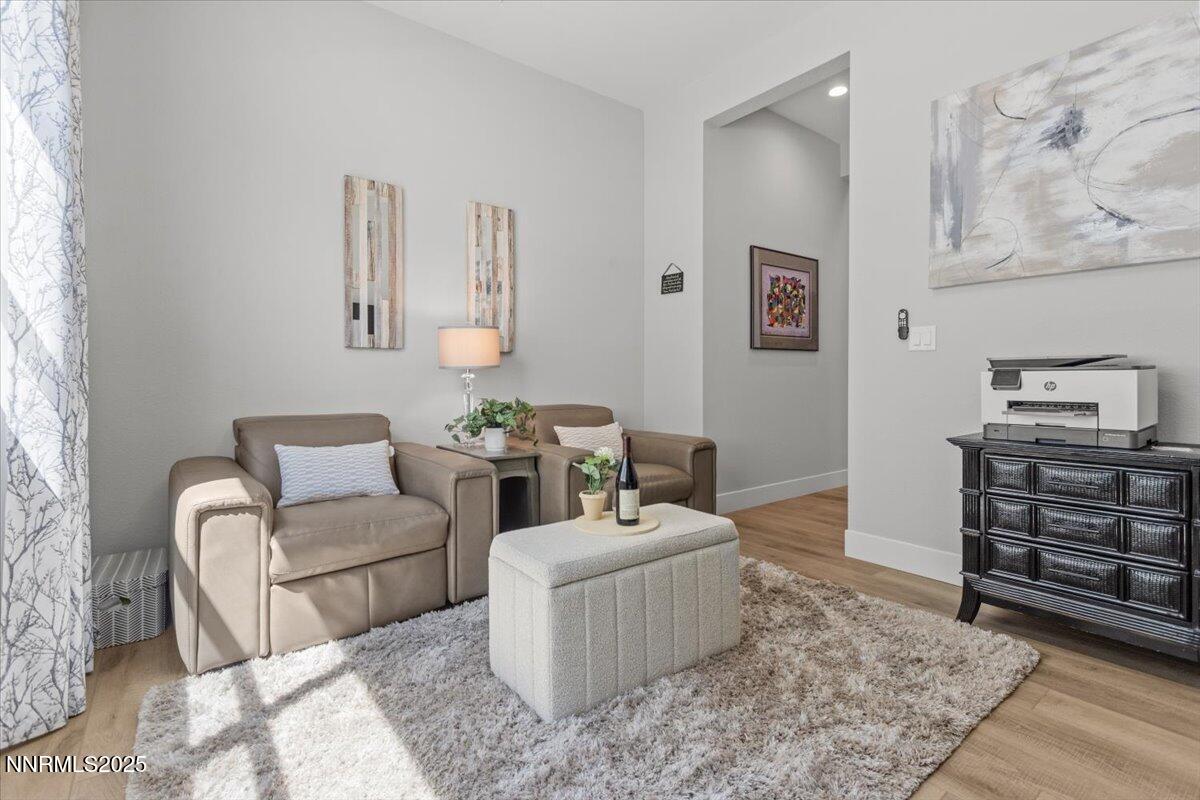 5517 Western Rider Trail Reno, NV 89511 - Photo 23 of 49 a living room with furniture and a couch