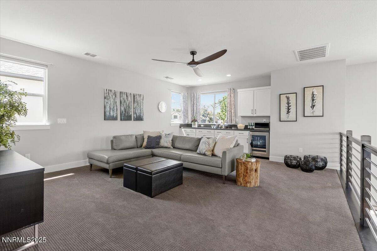 5517 Western Rider Trail Reno, NV 89511 - Photo 31 of 49 a living room with furniture and a window