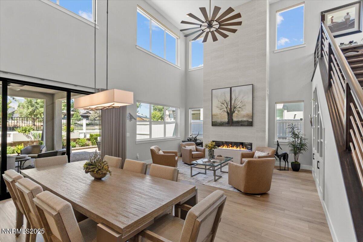 5517 Western Rider Trail Reno, NV 89511 - Photo 4 of 49 a view of a dining room with furniture window and wooden floor