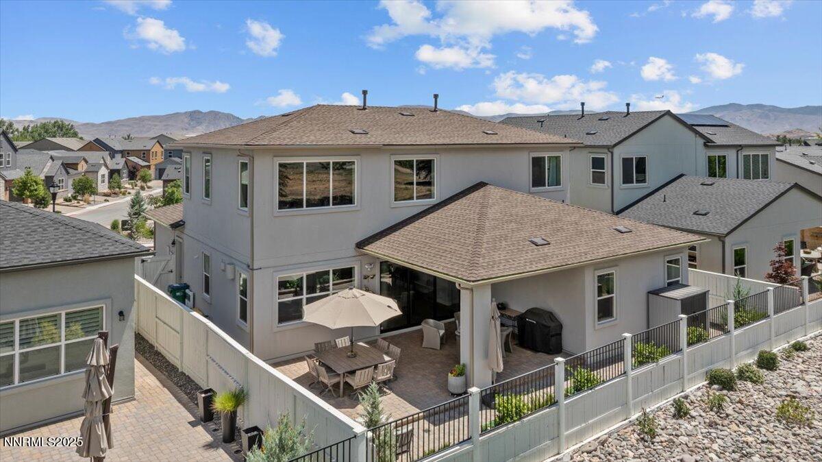 5517 Western Rider Trail Reno, NV 89511 - Photo 43 of 49 a aerial view of a house with roof deck