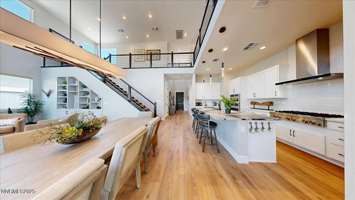 5517 Western Rider Trail Reno, NV 89511 - Photo 6 of 49 a kitchen with stainless steel appliances granite countertop lots of counter top space