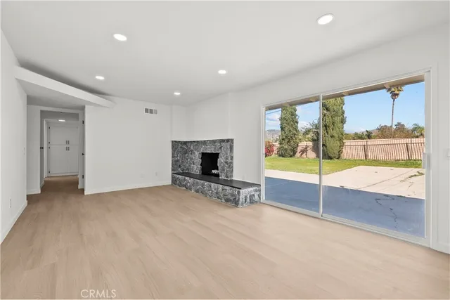 a kitchen with cabinets and stainless steel appliances