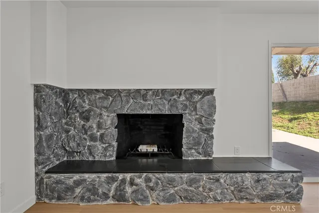 an aerial view of residential houses with outdoor space and swimming pool