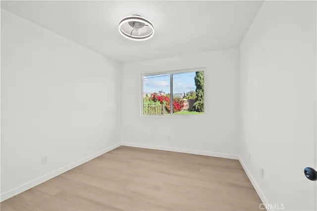 a view of a hallway with workspace