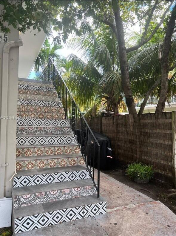 7035 Rue Granville, Unit 2 Miami Beach, FL 33141 - Photo 6 of 6 a view of a pathway of a yard