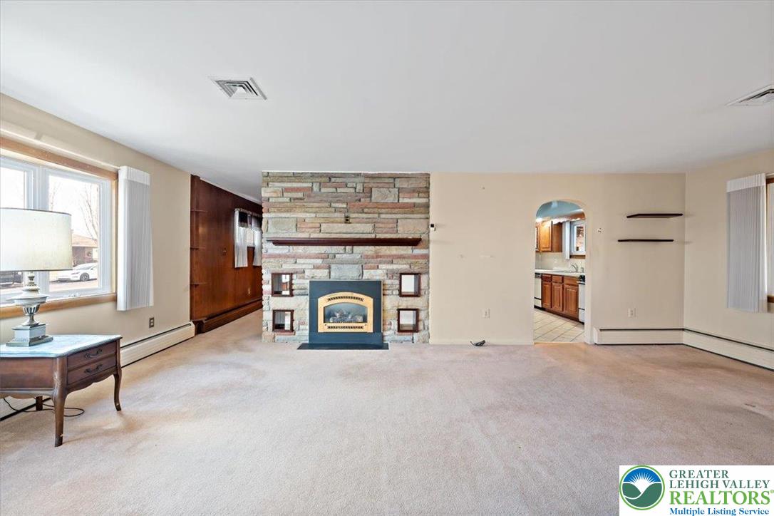 1240 Ridge Avenue Whitehall, PA 18052 - Photo 11 of 52 a view of a livingroom with furniture and a fireplace