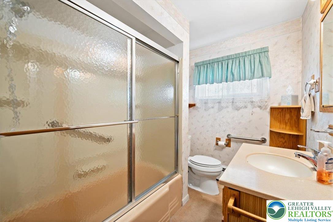 1240 Ridge Avenue Whitehall, PA 18052 - Photo 27 of 52 a bathroom with a sink toilet and shower