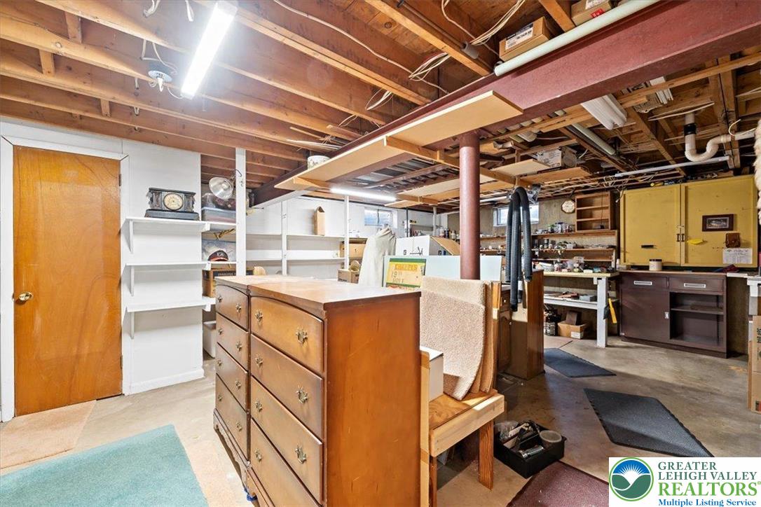 1240 Ridge Avenue Whitehall, PA 18052 - Photo 35 of 52 a kitchen with stainless steel appliances granite countertop a stove and a refrigerator