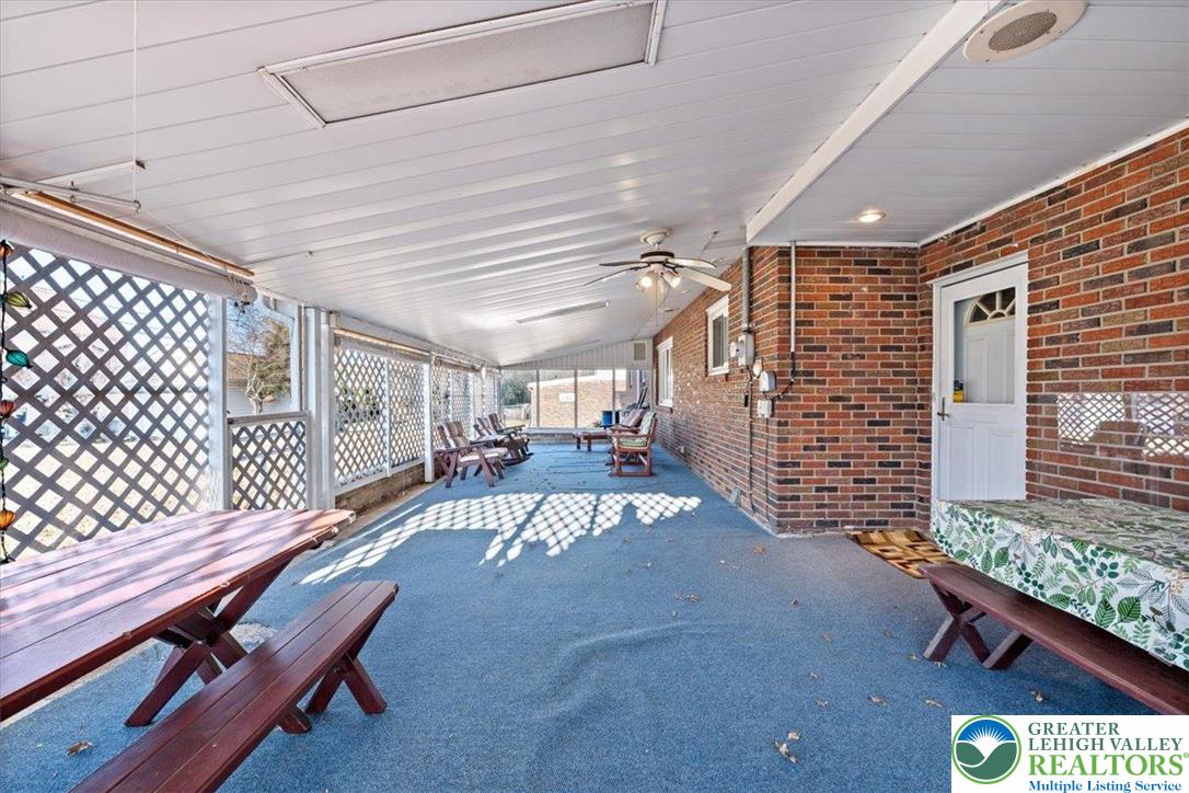 1240 Ridge Avenue Whitehall, PA 18052 - Photo 39 of 52 a view of a patio with table and chairs