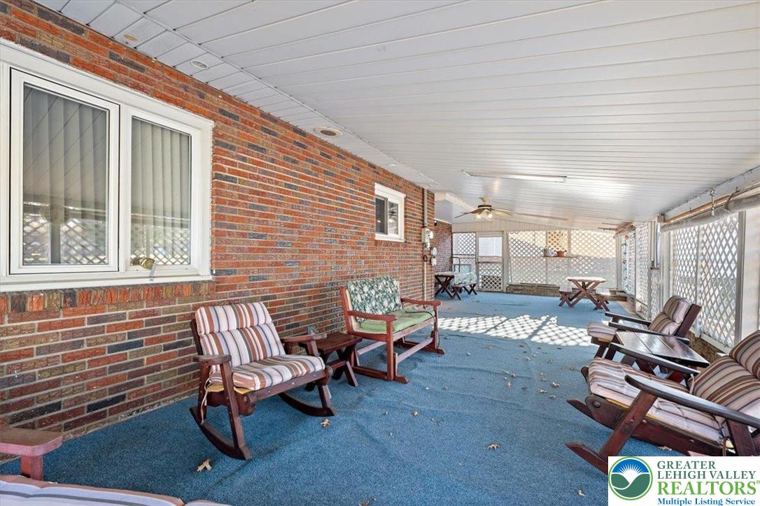 1240 Ridge Avenue Whitehall, PA 18052 - Photo 41 of 52 a living room with furniture and a window