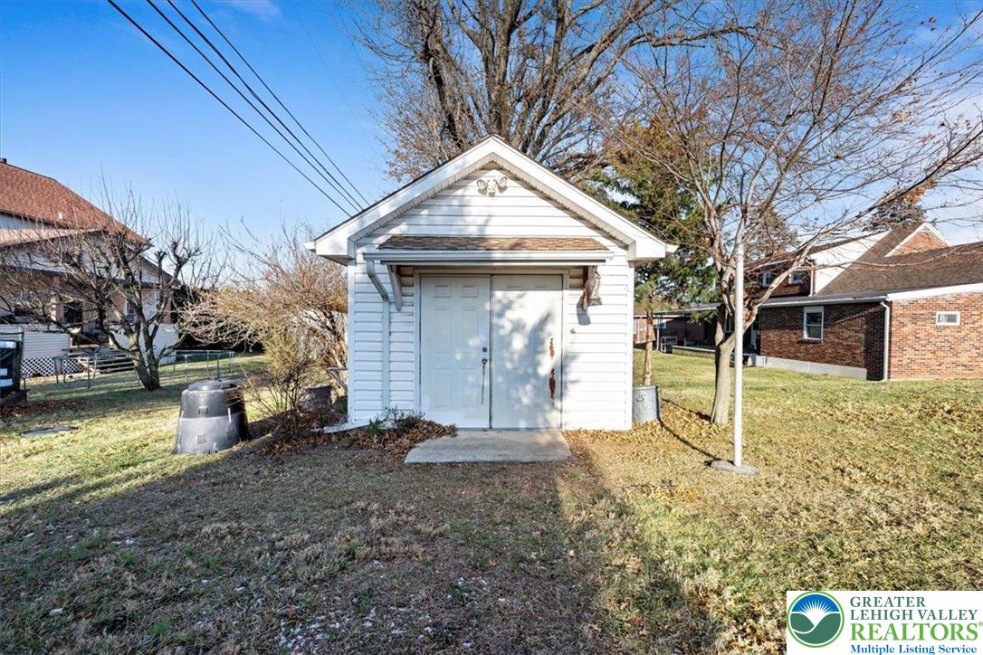 1240 Ridge Avenue Whitehall, PA 18052 - Photo 44 of 52 a view of a house with yard and garage