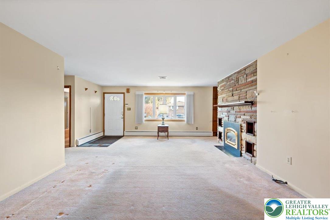 1240 Ridge Avenue Whitehall, PA 18052 - Photo 10 of 52 a view of a livingroom with furniture and a window