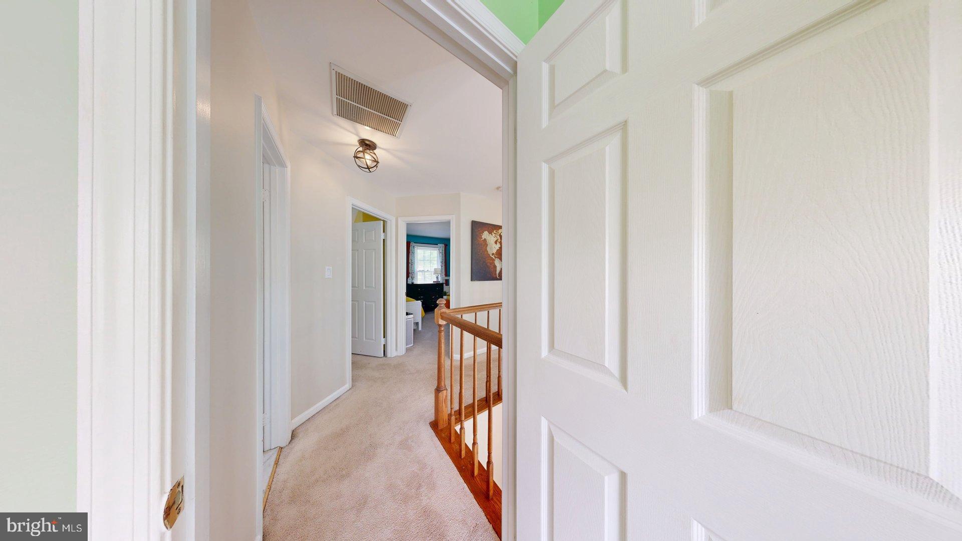 11901 Rustic Farm Court Germantown, MD 20874 - Photo 37 of 134 Inviting hallway with warm tones.