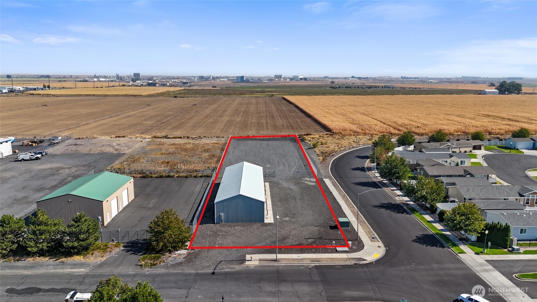 221 South Hamilton Road Moses Lake, WA 98837 - Photo 20 of 22 an aerial view of a house with a ocean view
