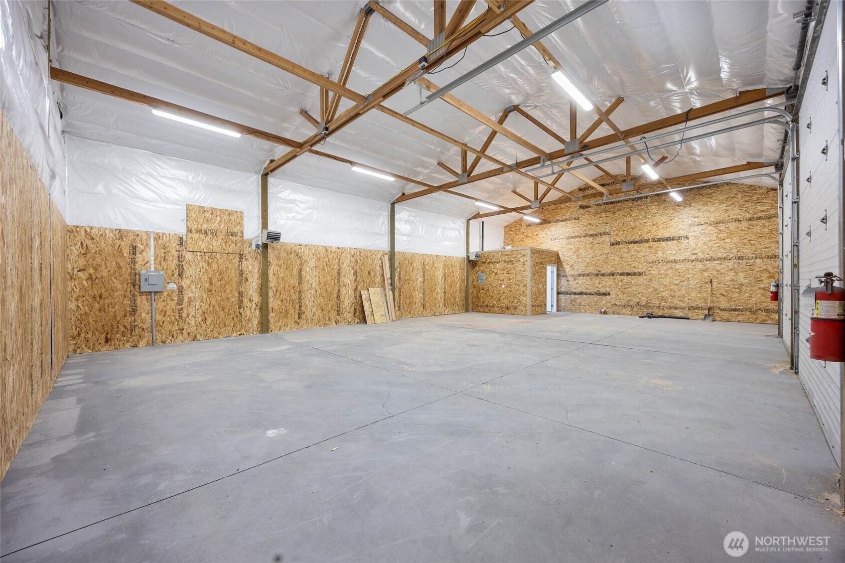 221 South Hamilton Road Moses Lake, WA 98837 - Photo 4 of 22 a view of a room with wooden walls
