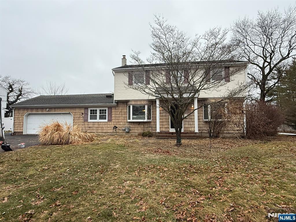 51 Harmer Terrace Wayne, NJ 07470 - Photo 1 of 1 front view of a house with a yard