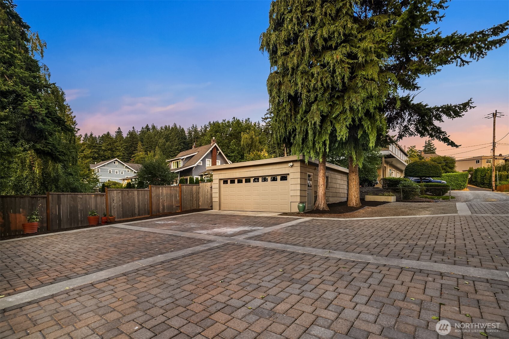 16947 Maplewild Avenue Southwest Burien, WA 98166 - Photo 19 of 23 a front view of a house with a yard and trees