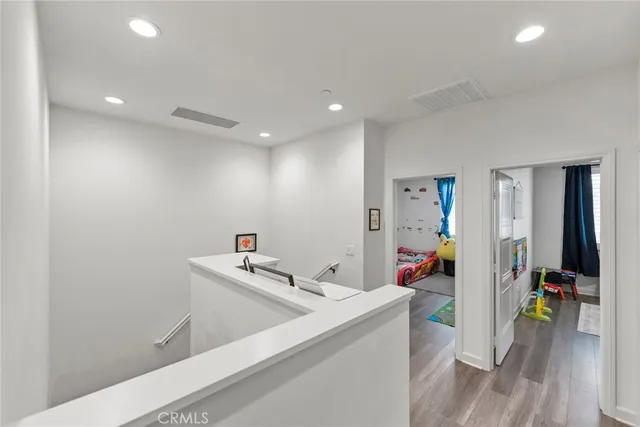 a bathroom with a double vanity sink mirror and shower