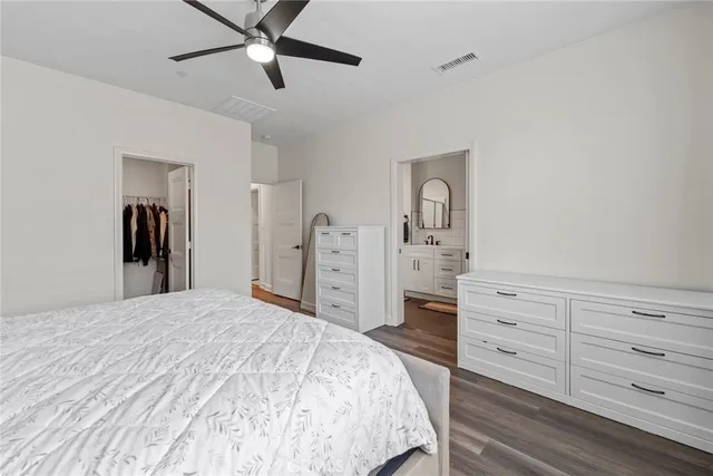 a bathroom with a shower and toilet