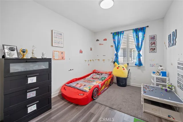 a outdoor space with the view of swimming pool and sitting space