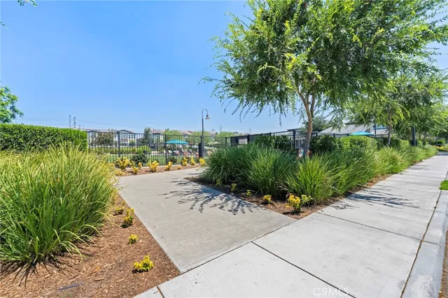 a view of a patio with a table and chairs