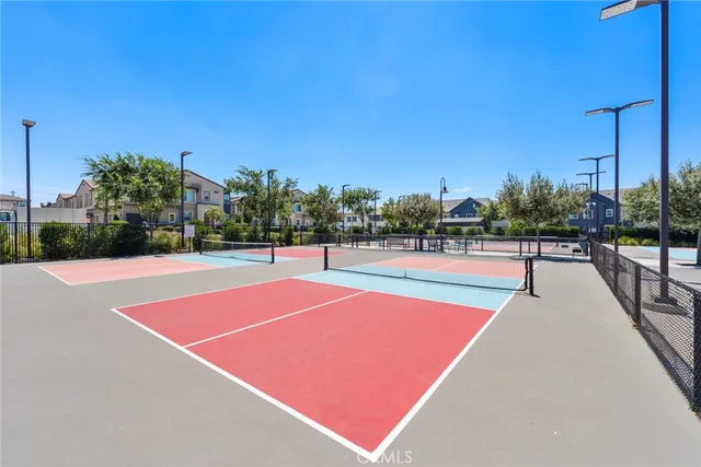 an aerial view of residential houses and outdoor space