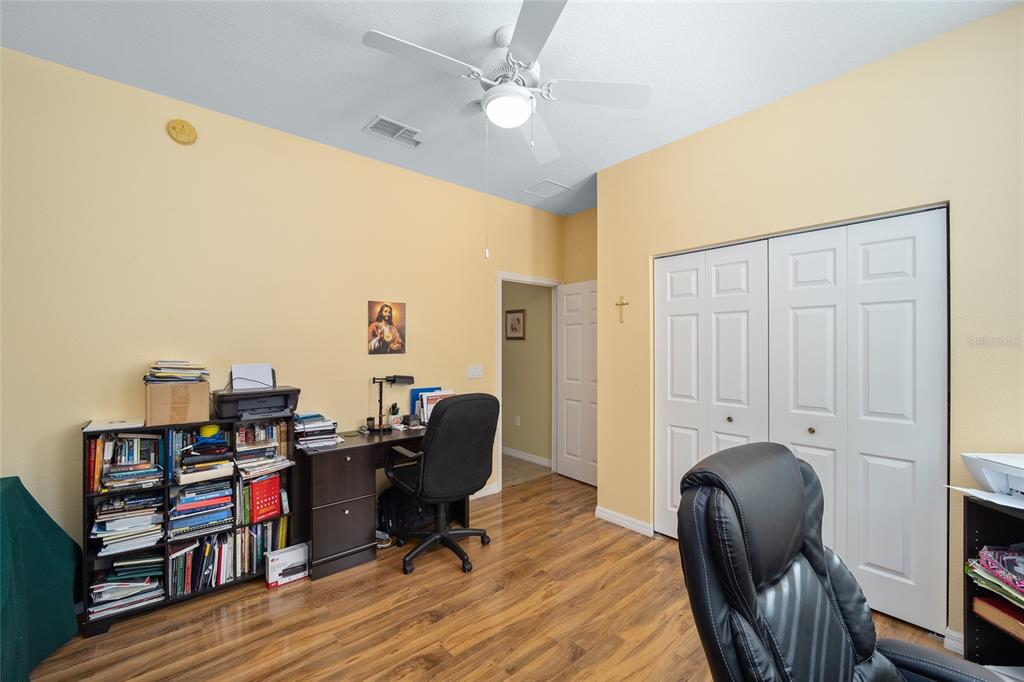 7947 South W 83rd Place Ocala, FL 34476 - Photo 11 of 28 a view of a workspace with furniture and a workspace