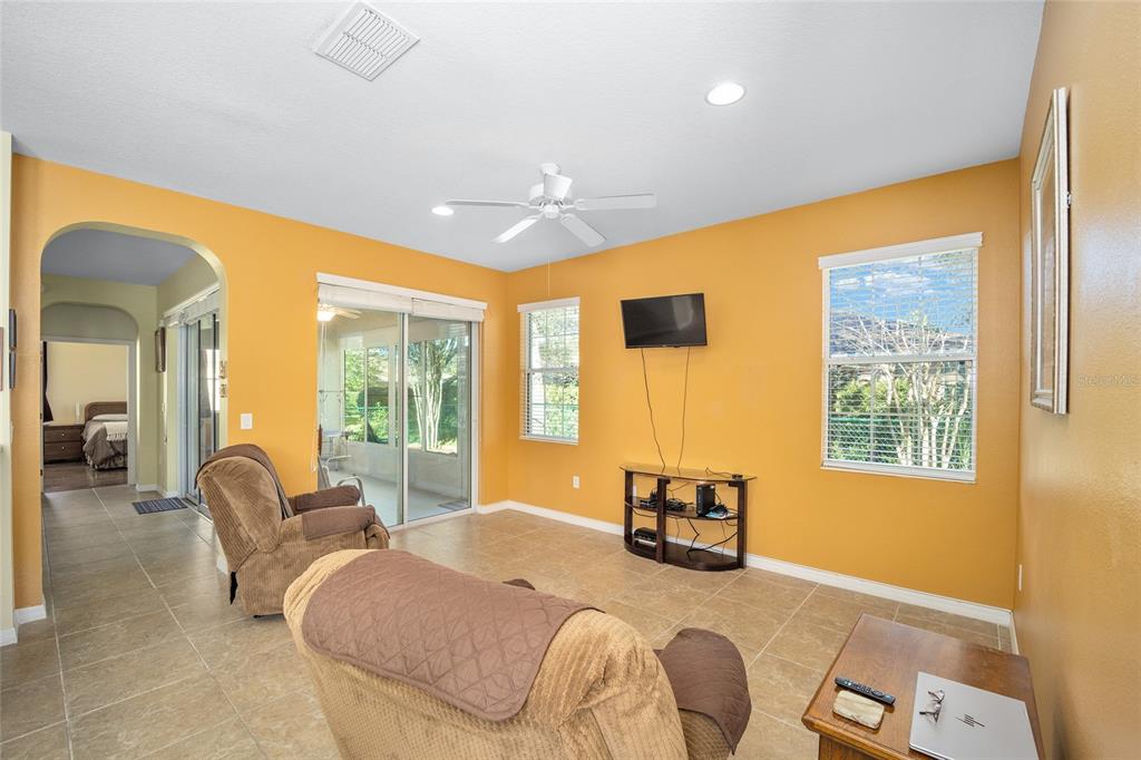 7947 South W 83rd Place Ocala, FL 34476 - Photo 15 of 28 a living room with furniture and a window