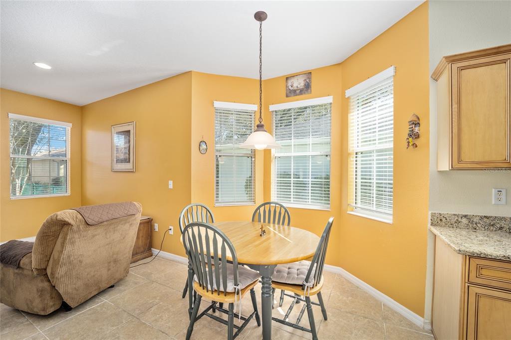 7947 South W 83rd Place Ocala, FL 34476 - Photo 17 of 28 a living room with furniture and a window