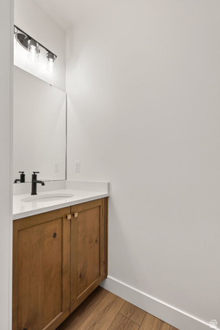 1661 West Ross Road Syracuse, UT 84075 - Photo 11 of 28 Bathroom with vanity and light wood finished floors