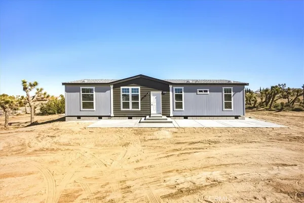 a large house with a swimming pool