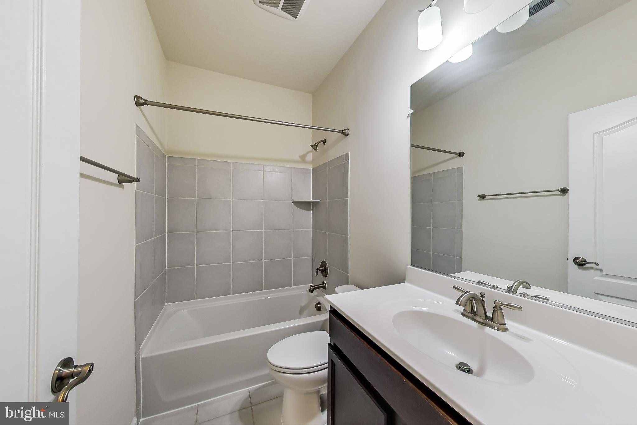 7436 Riding Meadow Way Manassas, VA 20111 - Photo 3 of 15 First level bathroom