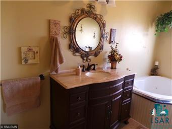 89082 Range Line Road Kerrick, MN 55756 - Photo 8 of 24 Beautifully decorated with separate shower and bath!