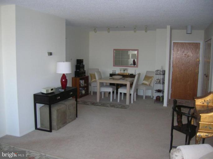 1800 Old Meadow Road, Unit 1415 McLean, VA 22102 - Photo 2 of 8 Living Room/Dining Room