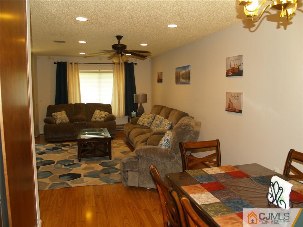 504 A Belford Road, Unit A Monroe Township, NJ 08831 - Photo 11 of 42 a living room with furniture and a window
