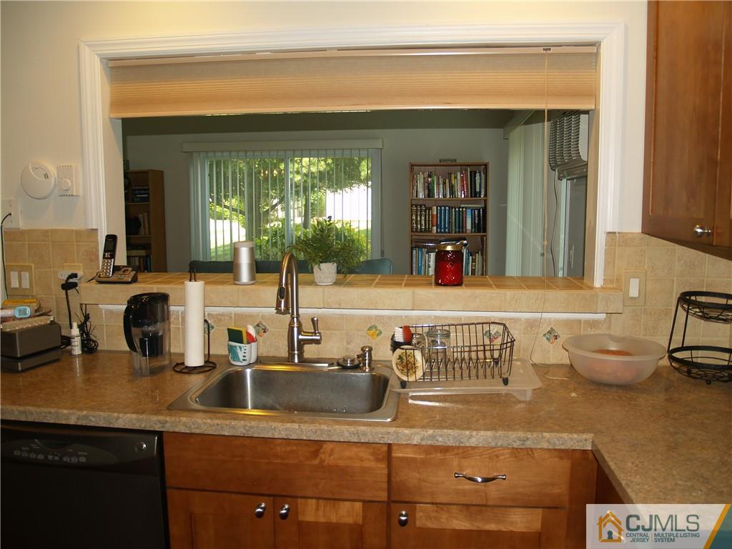 504 A Belford Road, Unit A Monroe Township, NJ 08831 - Photo 19 of 42 a bathroom with a sink and a window