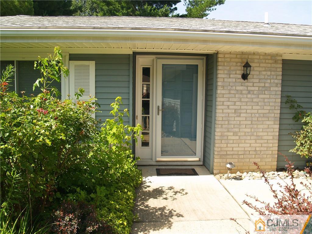 504 A Belford Road, Unit A Monroe Township, NJ 08831 - Photo 2 of 42 a view of a entryway door front of a house