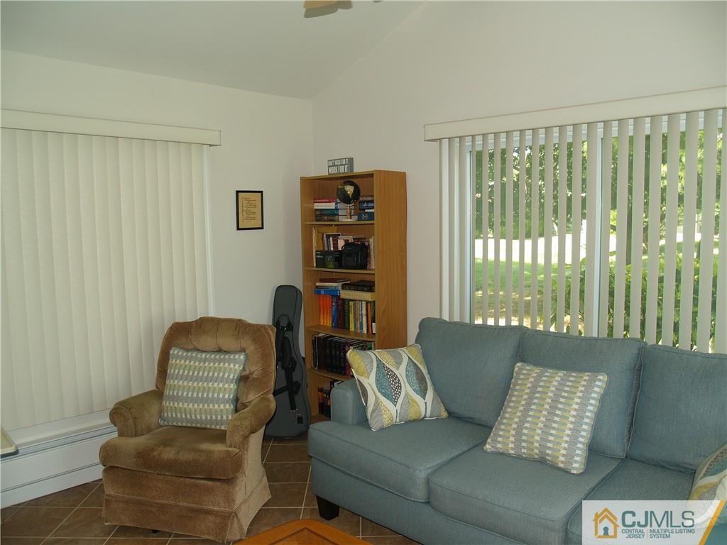 504 A Belford Road, Unit A Monroe Township, NJ 08831 - Photo 21 of 42 a living room with furniture and a large window