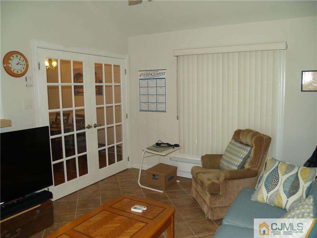 504 A Belford Road, Unit A Monroe Township, NJ 08831 - Photo 23 of 42 a room with furniture and a window