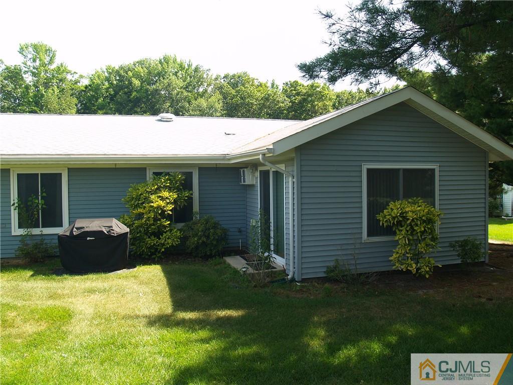 504 A Belford Road, Unit A Monroe Township, NJ 08831 - Photo 5 of 42 a view of a house with a garden