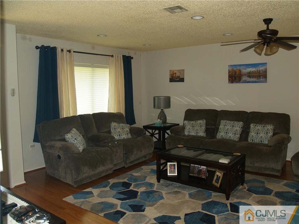 504 A Belford Road, Unit A Monroe Township, NJ 08831 - Photo 6 of 42 a living room with furniture and a window
