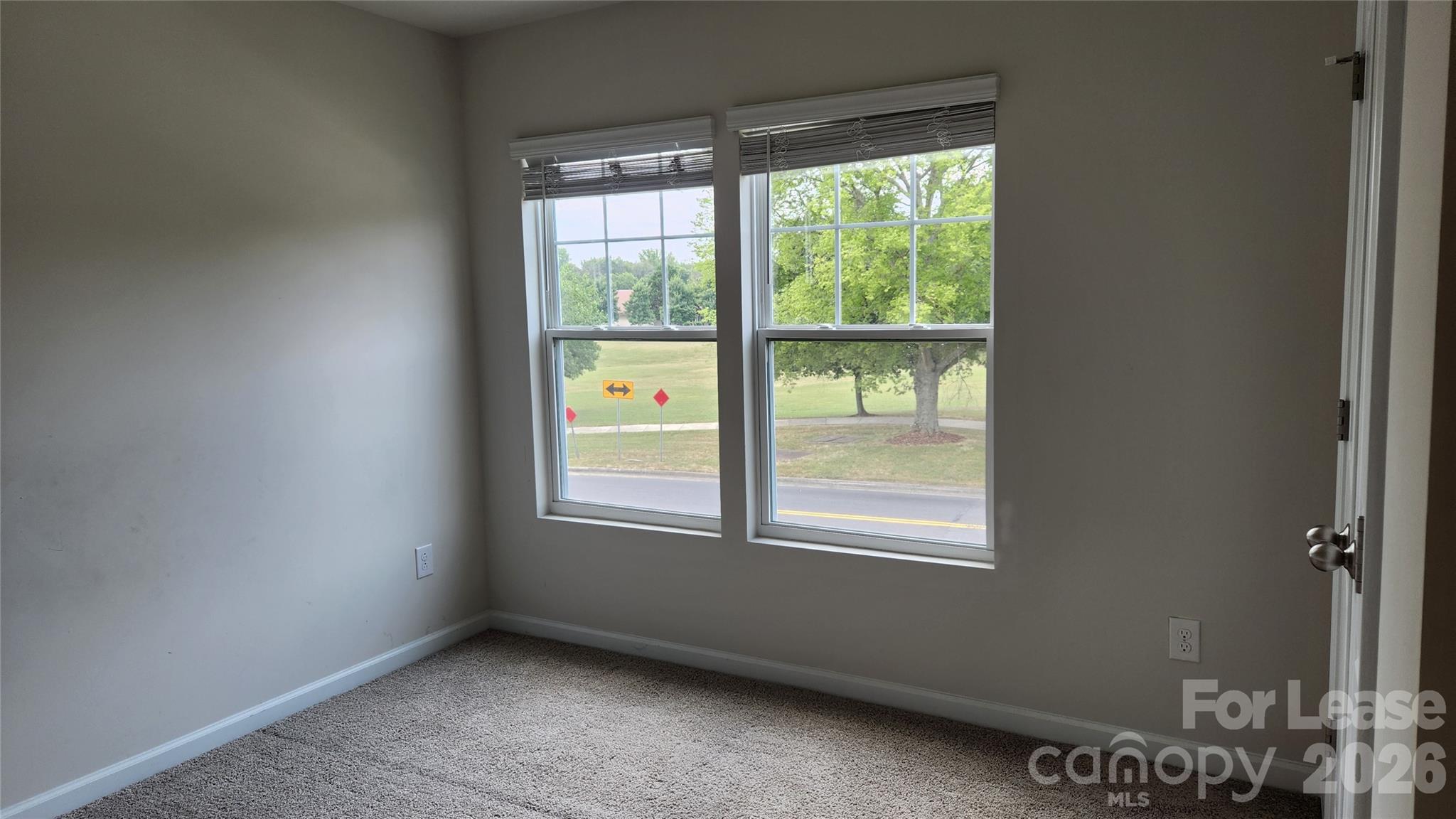 14320 Moss Road Charlotte, NC 28273 - Photo 13 of 22 a view of an empty room with a window