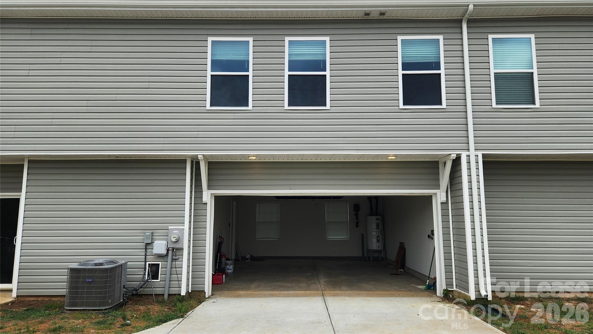 14320 Moss Road Charlotte, NC 28273 - Photo 21 of 22 a front view of a house with a garage