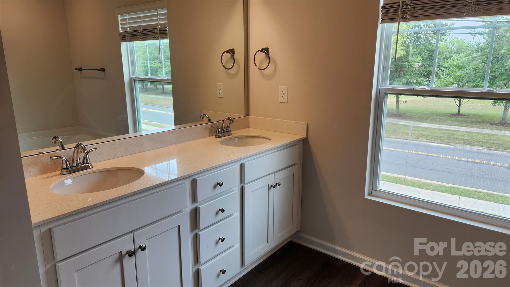 14320 Moss Road Charlotte, NC 28273 - Photo 10 of 22 a bathroom with a granite countertop sink and a window