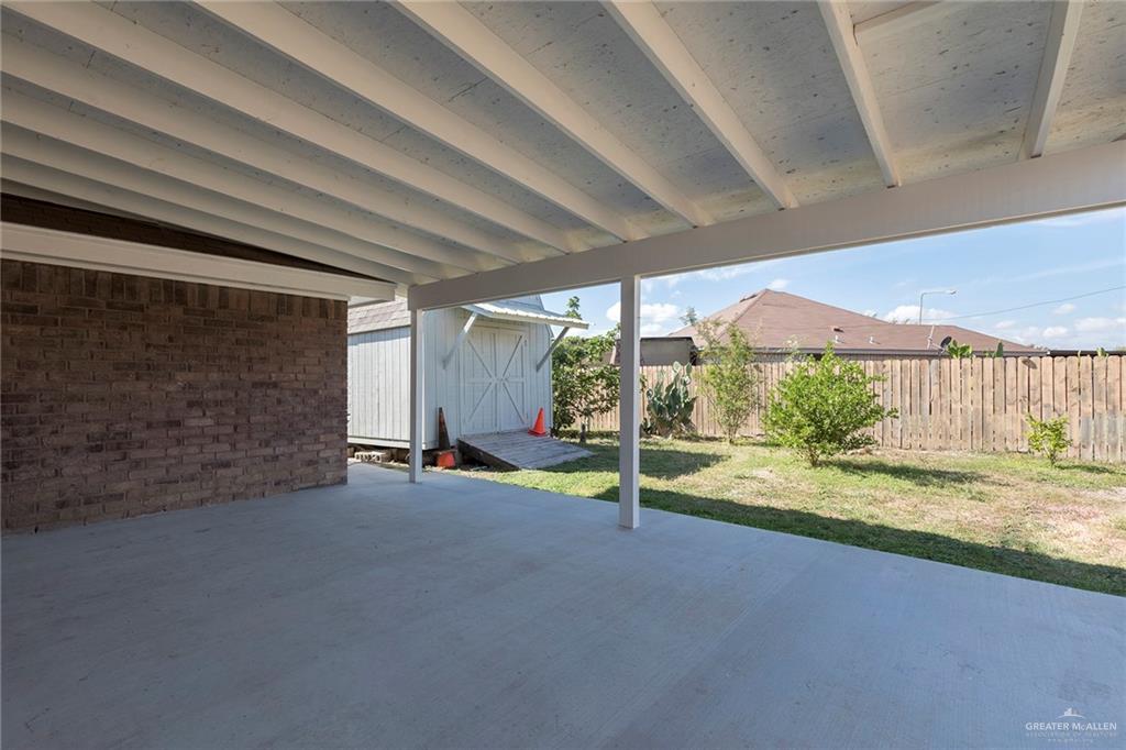 706 South 19th Street Hidalgo, TX 78557 - Photo 16 of 18 a view of a room with porch and wooden floor