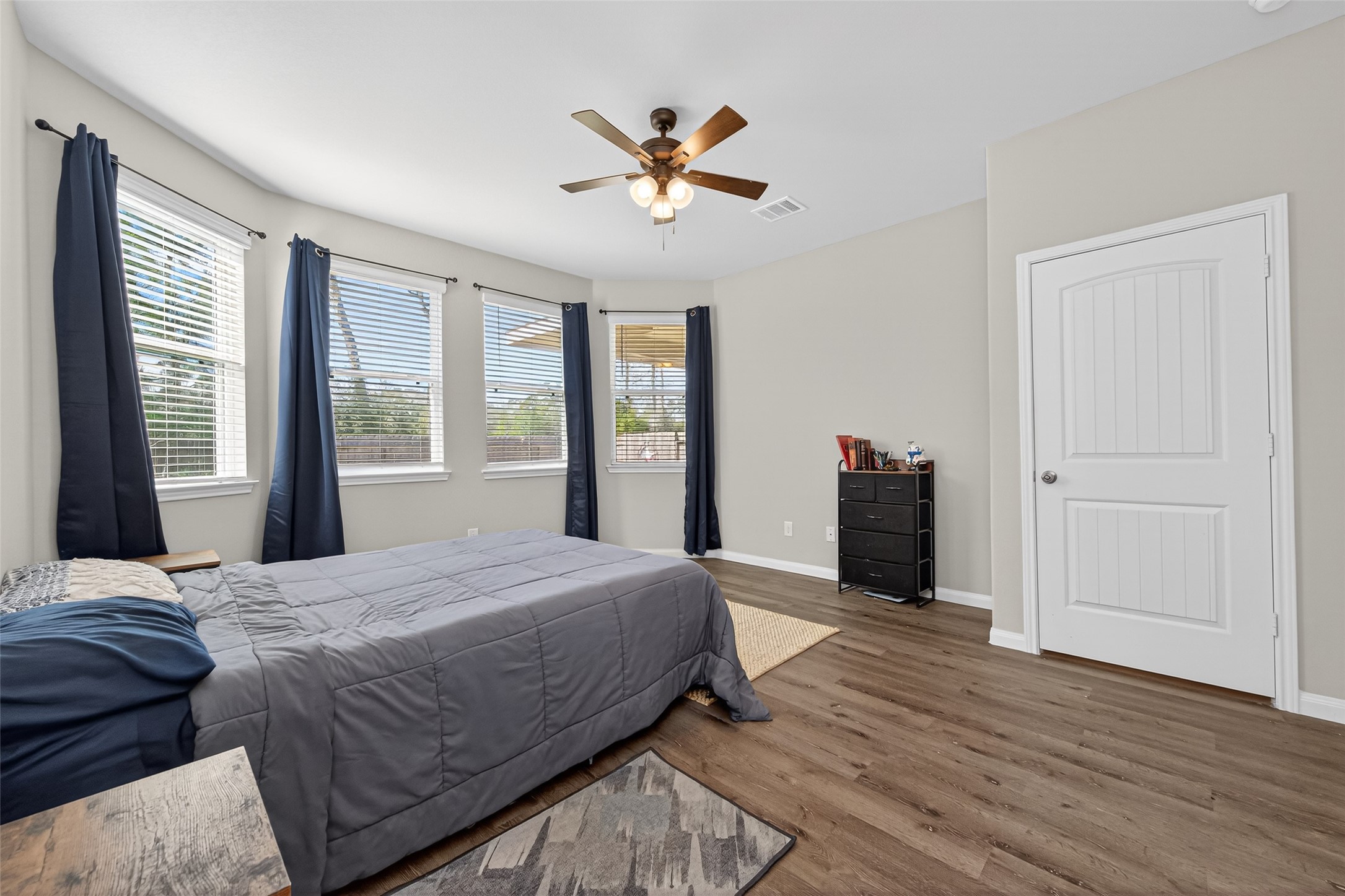 2354 Raider Drive Conroe, TX 77301 - Photo 7 of 20 a bedroom with a large bed and a window